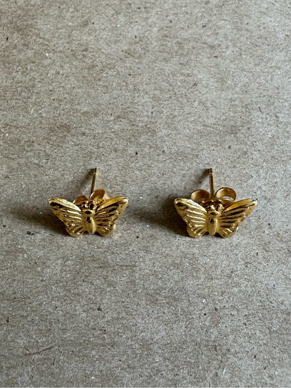 Set of gold butterfly earrings